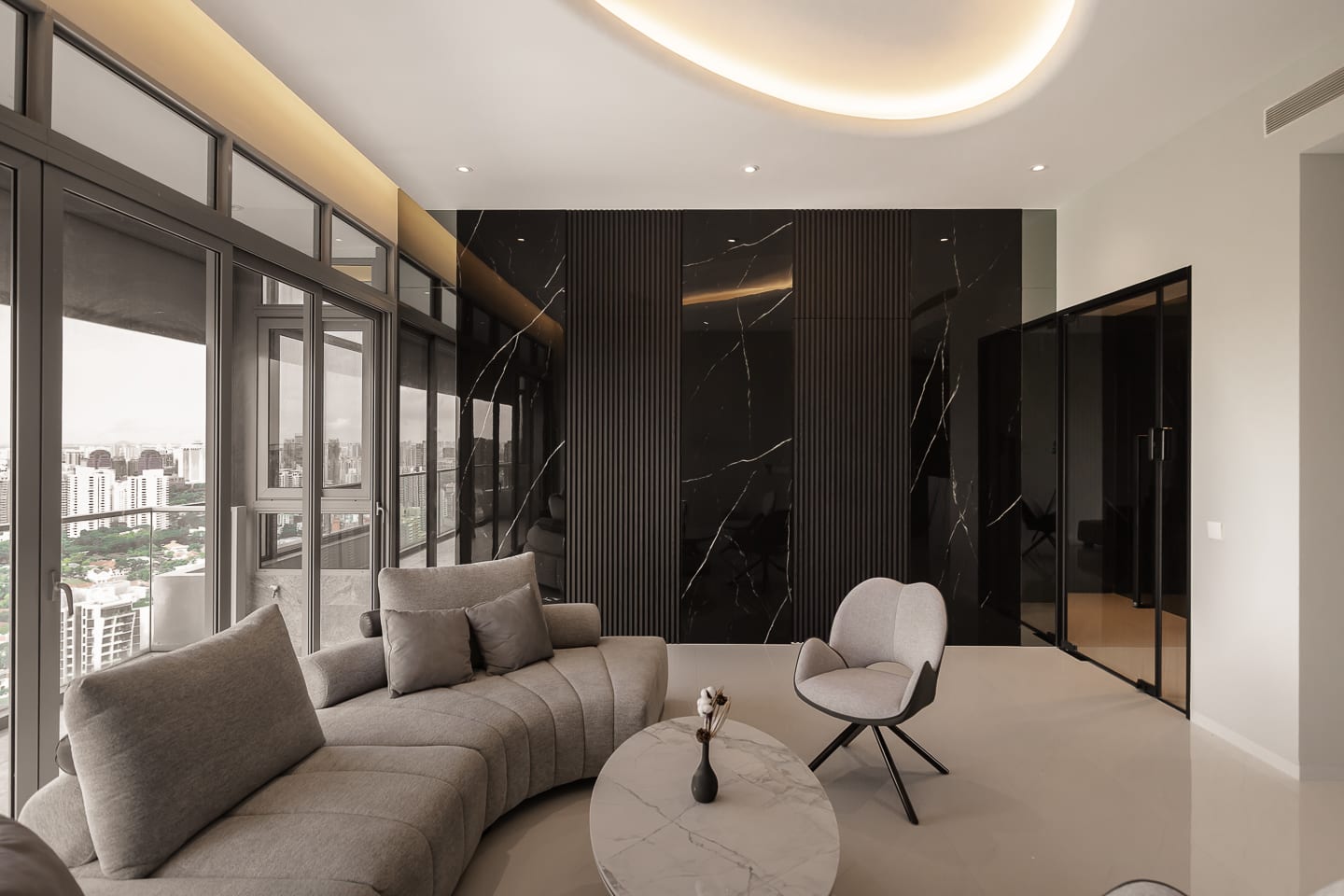 Soft curves and light wood textures in Jurong West residence